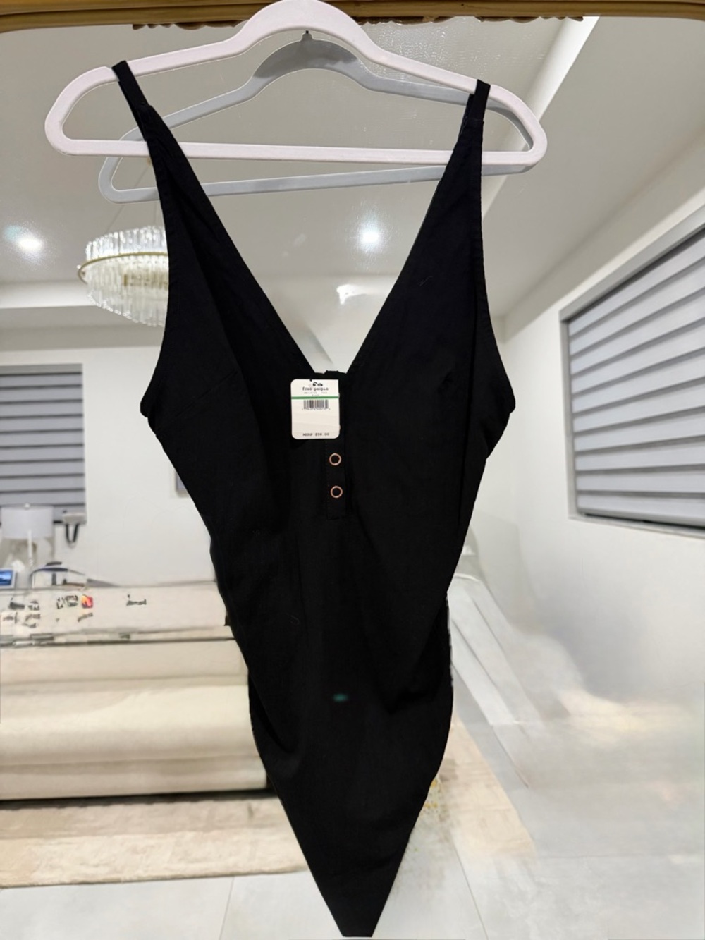 NWT. Free People Black V-Neck Ribbed Bodysuit size L